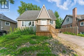 Welland (Lincoln/Crowland) apartment for rent - A house with a brown roof and a wooden fence is for sale.