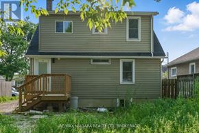 Welland (Lincoln/Crowland) apartment for rent - A two-story house with a deck and a garage door.