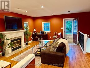 St. Catharines (Vine/Linwell) apartment for rent - A house with a white door and a sign that says "REALTOR" is shown.