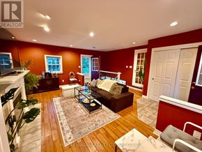 St. Catharines (Vine/Linwell) apartment for rent - A living room with a fireplace and a couch.