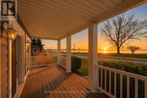 Fort Erie (Lakeshore) apartment for rent - A sunset view from a porch with a Re/Max sign.