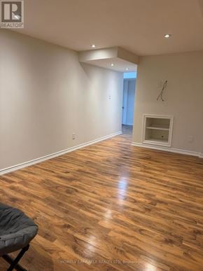 Richmond Hill (Jefferson) apartment for rent - A room with wooden flooring and a chair in it.