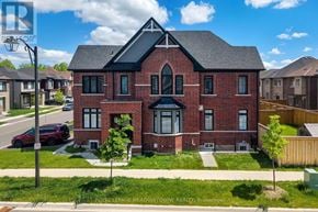 Milton (Cb Cobban) apartment for rent - A suburban neighborhood with houses and a road.