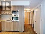 Toronto (Bay Street Corridor) condo for rent - A realtor's office is set up in a home.