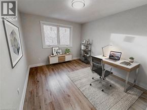 Kitchener apartment for rent - A room with a desk and a chair.