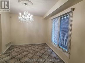 Vaughan (Crestwood-Springfarm-Yorkhill) apartment for rent - A room with a chandelier, tiled floor, and a window with blinds.