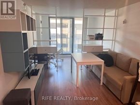 Toronto (Bay Street Corridor) condo for rent - A modern living room with a dining table and chairs.