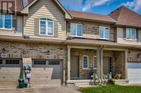 Hamilton (Stoney Creek Mountain) townhouse for rent - A two-story house with a garage on the left side.