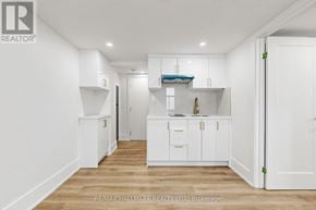Aurora (Aurora Highlands) apartment for rent - A white room with a door and a mirror on the wall.
