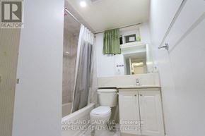Toronto (Agincourt North) apartment for rent - A small bathroom with a toilet, sink, and shower.