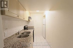 Toronto (Agincourt North) apartment for rent - A kitchen with granite countertops and a sink.