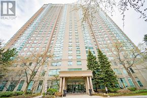 Toronto (Woburn) condo for rent - A tall building with a glass facade and a tree in front of it.