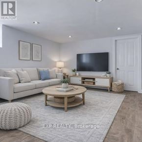 Toronto (Danforth Village-East York) apartment for rent - A well-lit living room with a white sofa, a wooden coffee table, and a flat-screen TV mounted on the wall.