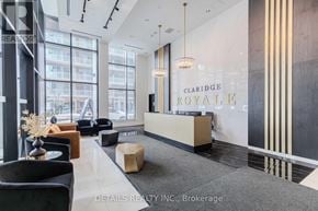 Ottawa condo for rent - A reception area with a desk and chairs in front of a Claridge Royale sign.