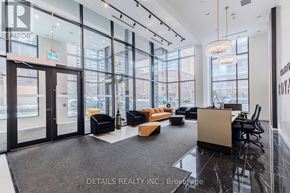 Ottawa condo for rent - A modern office space with black and white decor and a view of the city.