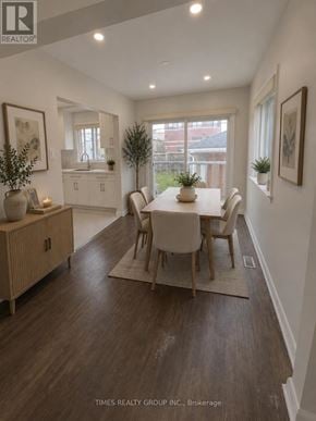 Toronto (Humbermede) apartment for rent - A dining room with a table set for four.