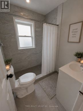 Toronto (Humbermede) apartment for rent - A bathroom with a toilet, sink, and shower.