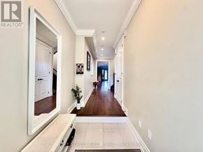 Mississauga (Lakeview) apartment for rent - A hallway with a white door and a plant on the left.