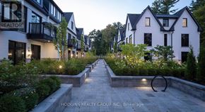 Mississauga (Mineola) townhouse for rent - A row of houses with a sign that says Realtor.
