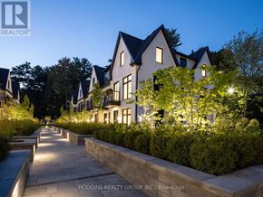 Mississauga (Mineola) townhouse for rent - A row of houses with a pathway in between them.