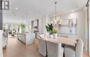 Mississauga (Mineola) townhouse for rent - A modern dining room with a large table and chairs.