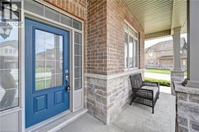 Kitchener apartment for rent - A room with a desk, chair, and couch.