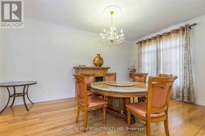 Richmond Hill (Rouge Woods) apartment for rent - A dining room with a round table and chairs.