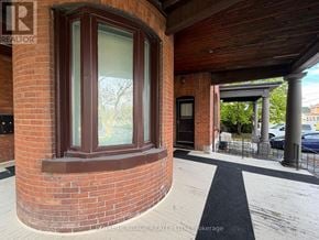 Belleville (Belleville Ward) fourplex for rent - A brick building with a black and white striped walkway.