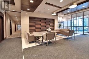 Mississauga (City Centre) condo for rent - A modern living room with a round table and chairs.