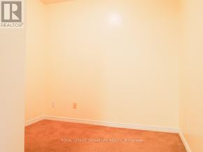 Richmond Hill (Langstaff) condo for rent - A room with a Royal LePage Signature Realty logo on the bottom left corner.