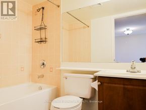 Richmond Hill (Langstaff) condo for rent - A bathroom with a toilet, sink, and bathtub.