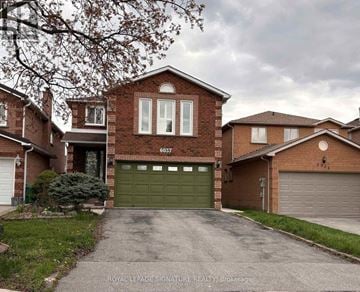 Mississauga (East Credit) apartment for rent - A house with the number 6037 on it is for sale.
