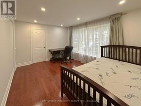 Toronto (Willowdale East) apartment for rent - A baby's room with a crib and a rocking chair.
