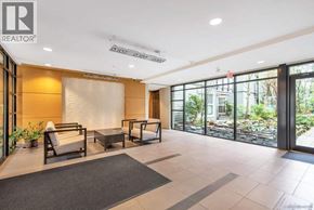 Vancouver apartment for rent - A spacious living room with a large window and sliding glass doors.