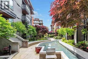 Vancouver apartment for rent - A pool surrounded by a patio and trees.