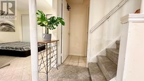 Markham (Aileen-Willowbrook) apartment for rent - A room with a staircase and a bed.