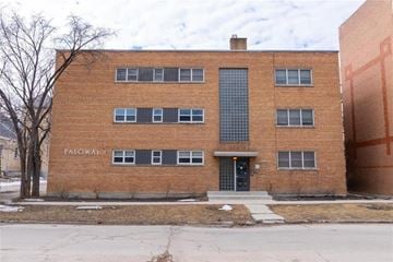 Winnipeg apartment for rent - A brick building with the words "Palomar 1" on the side.