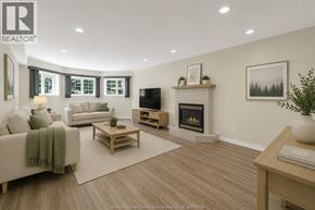 Windsor apartment for rent - A living room with a fireplace and a television.