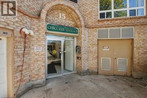 Kitchener condo for rent - A brick building with a sign that says Chicopee Avenue.