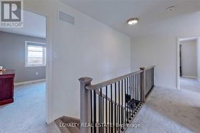 Clarington (Bowmanville) apartment for rent - A white room with a balcony railing and a window.