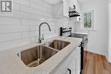 Niagara-On-The-Lake (Town) apartment for rent - A kitchen with a sink and a window.
