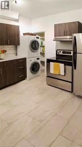 Hamilton apartment for rent - A kitchen with a white fridge and a white dishwasher.