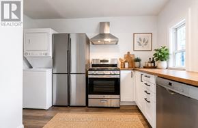 Hamilton (Stipley) apartment for rent - A modern kitchen with stainless steel appliances and white cabinets.