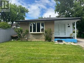 Brampton (Madoc) apartment for rent - A house with a white door and a small porch.