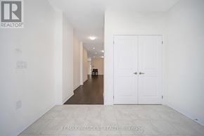 Wellington North (Arthur) apartment for rent - A long hallway with a white door at the end.