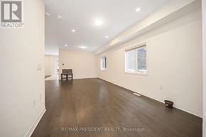 Wellington North (Arthur) apartment for rent - A spacious room with wooden flooring and a single chair.