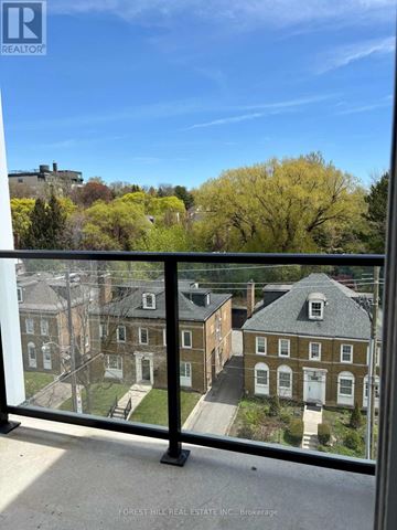 Toronto (Humewood-Cedarvale) house for rent - A view from a balcony overlooking a residential area.