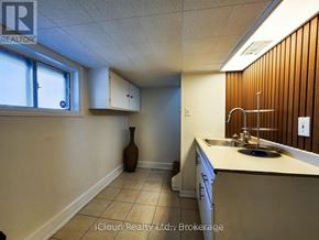 Hamilton (Homeside) apartment for rent - A kitchen with a sink and a window.