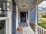 Markham (Unionville) apartment for rent - A porch with a white railing and a brown hand rail.