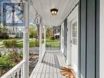 Markham (Unionville) apartment for rent - A porch with a white railing and a leaf on the floor.